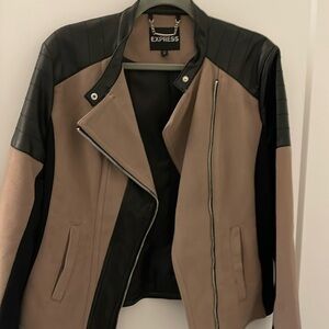 Black and light tan/cream jacket with faux leather details!